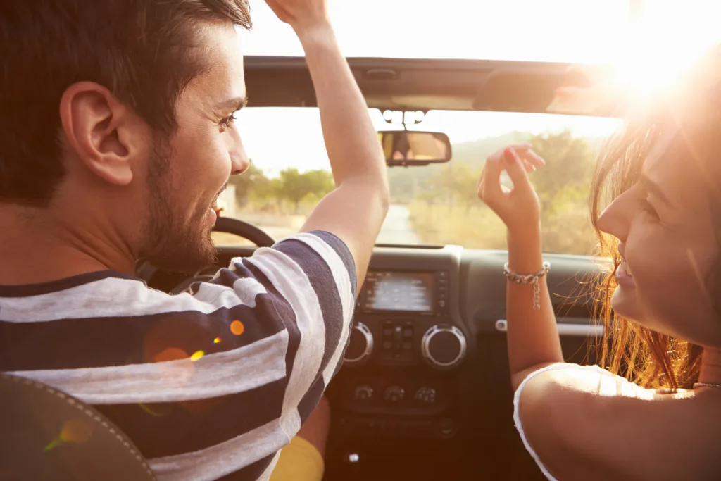 People driving in a convertible