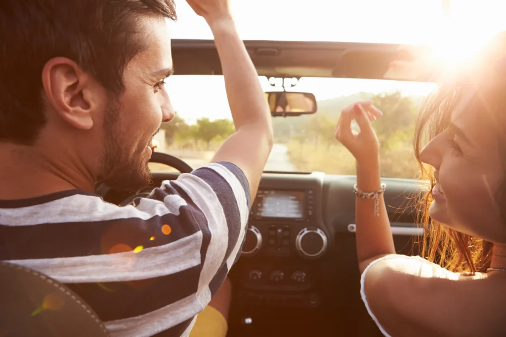 People driving in a convertible