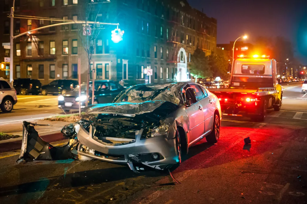 A close up of an auto accident at night